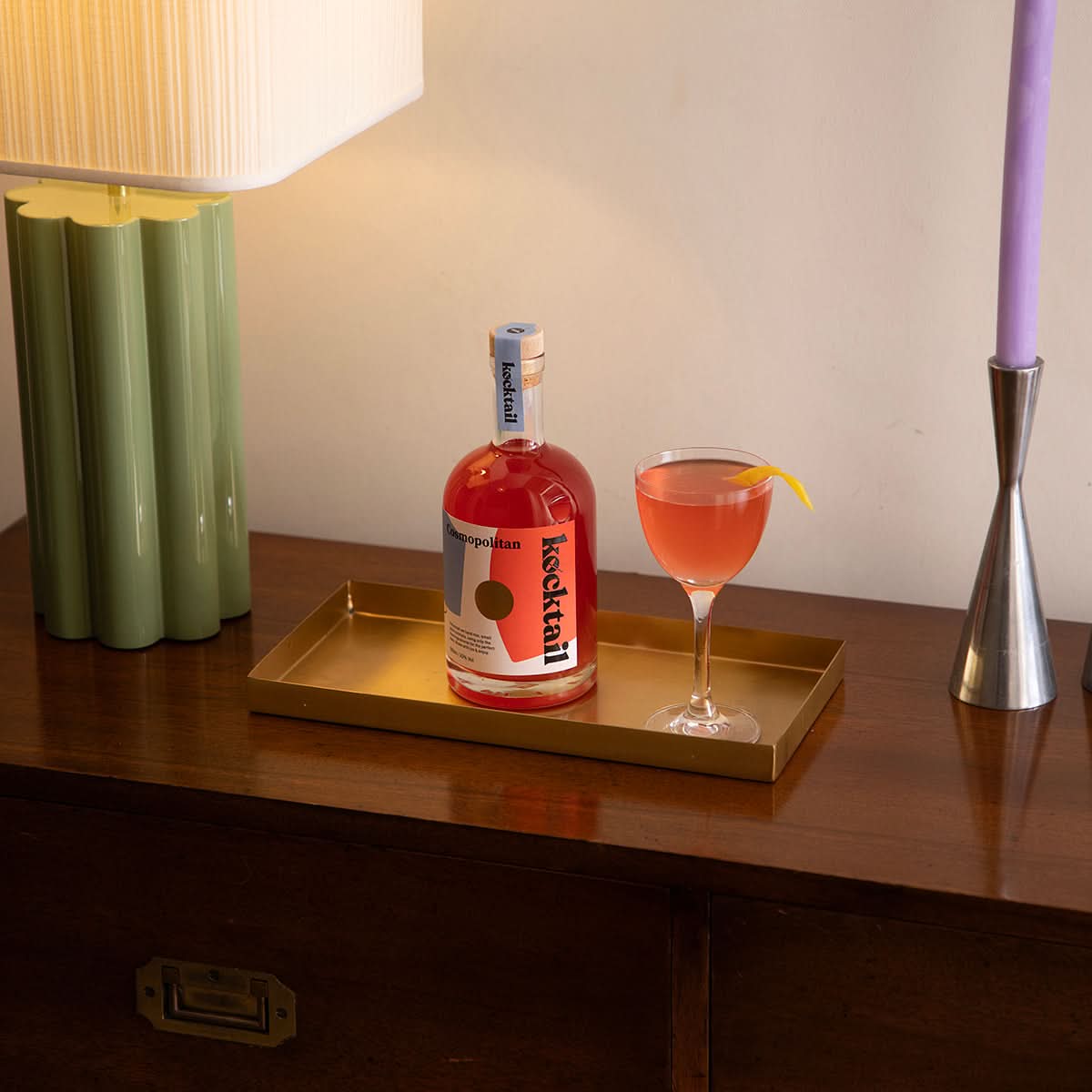 Cosmopolitan bottled cocktail by Kocktail shown with a finished serve, featuring bold pink liquid and stylish glassware