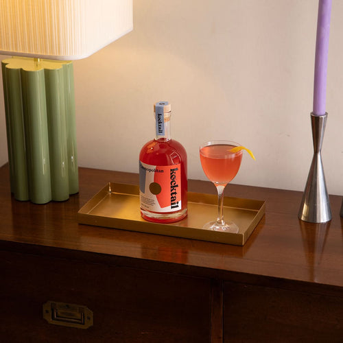 Cosmopolitan bottled cocktail by Kocktail shown with a finished serve, featuring bold pink liquid and stylish glassware