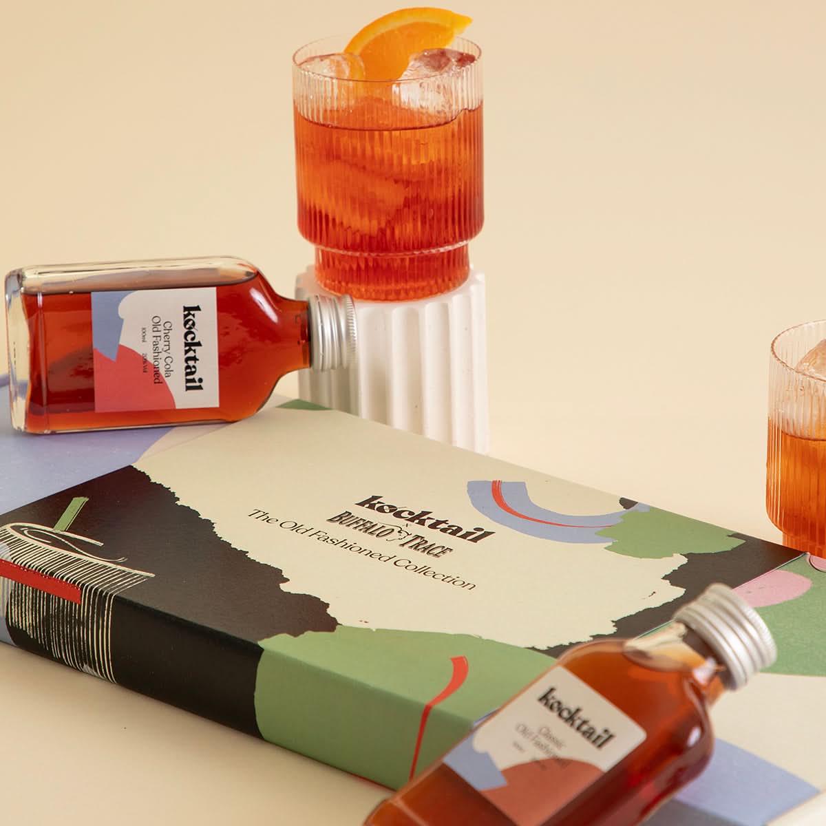 Kocktail Old Fashioned Collection featuring four 100ml bottled cocktails in a premium gift box, showcasing whiskey-based twists